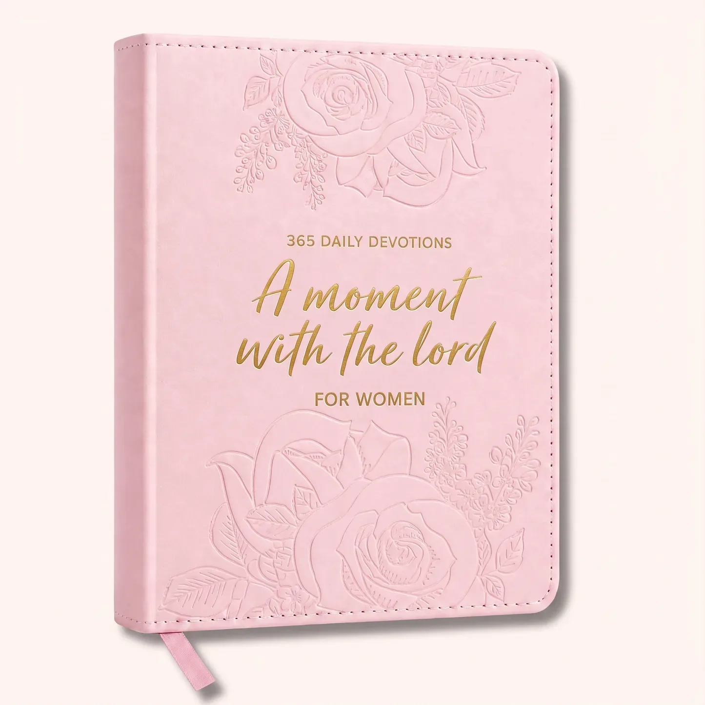 Pink faux leather devotional with embossed roses, front three-quarter view