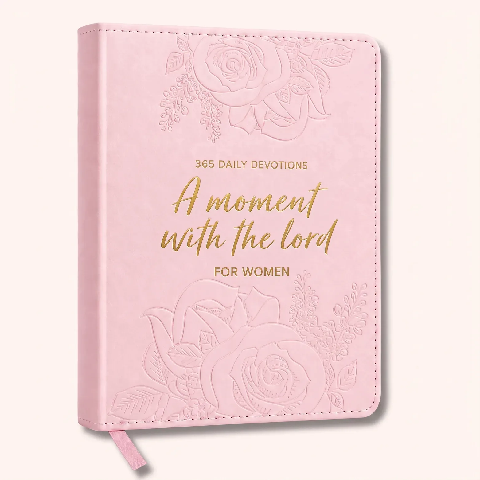 Pink faux leather devotional with embossed roses, front three-quarter view